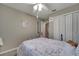 Charming bedroom with a full-size bed and ample closet space at 1748 Christina Lee Lane, St Cloud, FL 34769