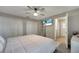 Bedroom with a queen-size bed, large closet, and en-suite bathroom at 1748 Christina Lee Lane, St Cloud, FL 34769
