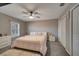 Spacious bedroom with a king-size bed, and double door closet at 1748 Christina Lee Lane, St Cloud, FL 34769