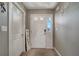 Bright and airy entryway with neutral colors and flooring at 1748 Christina Lee Lane, St Cloud, FL 34769