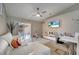 Living room with comfy seating and access to backyard at 1748 Christina Lee Lane, St Cloud, FL 34769