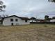 View of the back of the house and backyard at 1821 Rogers Ave, Maitland, FL 32751