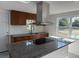 Modern kitchen with granite countertops and stainless steel appliances at 1821 Rogers Ave, Maitland, FL 32751