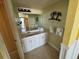 Clean bathroom with vanity, sink, and shower/tub combination at 2301 S Atlantic Ave # 240, Daytona Beach, FL 32118