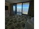 Ocean view bedroom with sliding doors to balcony at 2301 S Atlantic Ave # 240, Daytona Beach, FL 32118