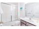 Bathroom with shower/tub combo, vanity, and updated fixtures at 2501 Dharma Cir, Kissimmee, FL 34746