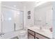 Clean bathroom with tub shower combo and vanity at 2501 Dharma Cir, Kissimmee, FL 34746