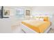 Bedroom with king-size bed, nightstand, and window coverings at 2501 Dharma Cir, Kissimmee, FL 34746
