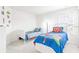 bedroom with two twin beds and superhero bedding at 2501 Dharma Cir, Kissimmee, FL 34746