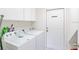 Convenient laundry room with washer and dryer at 2501 Dharma Cir, Kissimmee, FL 34746