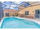 Inviting screened pool with patio furniture at 2501 Dharma Cir, Kissimmee, FL 34746