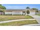 Ranch style home with landscaped lawn and updated facade at 2510 Kiowa Trl, Fern Park, FL 32730