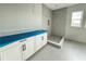 Bathroom with a modern walk-in shower and white vanity at 2726 Ravencliffe Ter, Oviedo, FL 32765