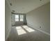 Unfinished bedroom with neutral walls, natural light from two windows, and awaiting final touches at 2726 Ravencliffe Ter, Oviedo, FL 32765