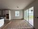 Open dining area with access to outdoor patio via sliding glass doors and views of the backyard at 2726 Ravencliffe Ter, Oviedo, FL 32765