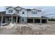 New construction home featuring an attached two car garage in a residential neighborhood at 2726 Ravencliffe Ter, Oviedo, FL 32765