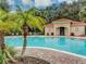 Community pool with clubhouse at 3183 Tocoa Cir, Kissimmee, FL 34746