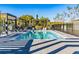 Inviting pool area with pergola, lounge chairs, and grill at 3261 Tranquil Trl, Kissimmee, FL 34747