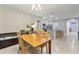 Open dining room with a view of the kitchen at 3627 Crimson Clover Dr, Mount Dora, FL 32757