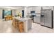 Modern kitchen with stainless steel appliances and a large island at 3627 Crimson Clover Dr, Mount Dora, FL 32757
