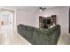 Spacious living room featuring a large sectional sofa and built-in shelving at 3627 Crimson Clover Dr, Mount Dora, FL 32757