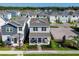 Aerial view of two story house and community at 368 Belmond Dr, Debary, FL 32713