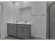 Modern bathroom with double vanity and shower at 368 Belmond Dr, Debary, FL 32713