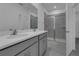Updated bathroom with double vanity and shower at 368 Belmond Dr, Debary, FL 32713