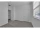 Spacious bedroom with grey carpet and white doors at 368 Belmond Dr, Debary, FL 32713