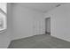 Spacious bedroom with neutral carpeting and double door closet at 368 Belmond Dr, Debary, FL 32713