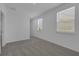 Simple bedroom with gray carpet and neutral walls at 368 Belmond Dr, Debary, FL 32713