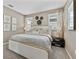 Spacious bedroom with king-size bed, neutral decor and natural light at 368 Belmond Dr, Debary, FL 32713