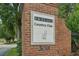 Brick sign at entrance to Debary Country Club, featuring logo at 368 Belmond Dr, Debary, FL 32713