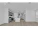 Modern kitchen with gray cabinets, white island, and stainless steel appliances at 368 Belmond Dr, Debary, FL 32713