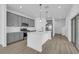 Open concept kitchen with island and stainless steel appliances at 368 Belmond Dr, Debary, FL 32713