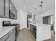 Modern kitchen with gray cabinets and white countertops at 368 Belmond Dr, Debary, FL 32713