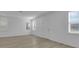 Bright and airy living room with hardwood floors and neutral walls at 368 Belmond Dr, Debary, FL 32713