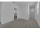Spacious loft area with neutral carpeting and access to a bedroom at 368 Belmond Dr, Debary, FL 32713