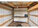 Interior of a storage shed with shelves for tools and equipment at 37710 Quail Ridge Cir, Leesburg, FL 34788