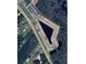 Aerial view of Harmony Central community with homes and a lake at 4472 Sagefield Dr, St Cloud, FL 34773