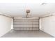 Clean garage featuring a garage door offering secure parking and extra storage space at 512 Holbrook Cir, Lake Mary, FL 32746