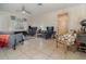 Living room with tile flooring, comfortable seating, and ceiling fan at 5158 Twine St, Orlando, FL 32821