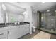 Spa-like bathroom with double vanity and shower at 525 E Jackson St # 307, Orlando, FL 32801