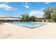 Community swimming pool with lounge chairs at 5824 La Costa Dr, Orlando, FL 32807