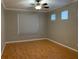 Bright bedroom with hardwood floors and large window at 6344 Earthgold Dr, Windermere, FL 34786