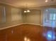 Spacious dining area with hardwood floors at 6344 Earthgold Dr, Windermere, FL 34786