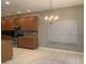 Kitchen features granite countertops and wood cabinets at 6344 Earthgold Dr, Windermere, FL 34786