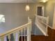 Upper hallway offering a view of the lower level at 6344 Earthgold Dr, Windermere, FL 34786