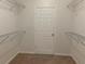 Large walk-in closet with wire shelving at 6344 Earthgold Dr, Windermere, FL 34786