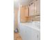 Laundry room with washer, dryer, and overhead cabinets at 6375 Lolly Bay Ne Loop, Winter Haven, FL 33881
